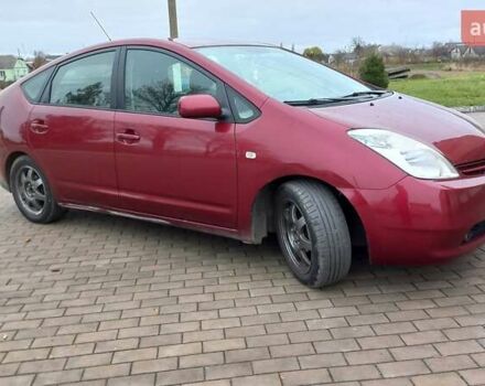 Красный Тойота Приус, объемом двигателя 1.5 л и пробегом 226 тыс. км за 6500 $, фото 4 на Automoto.ua