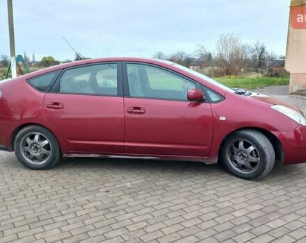 Красный Тойота Приус, объемом двигателя 1.5 л и пробегом 226 тыс. км за 6500 $, фото 6 на Automoto.ua