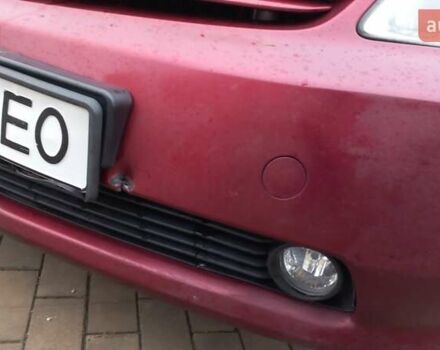 Красный Тойота Приус, объемом двигателя 1.5 л и пробегом 226 тыс. км за 6500 $, фото 3 на Automoto.ua