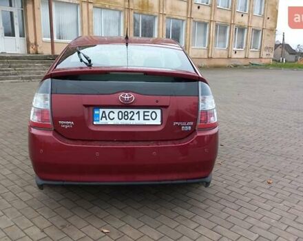 Красный Тойота Приус, объемом двигателя 1.5 л и пробегом 226 тыс. км за 6500 $, фото 12 на Automoto.ua