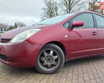 Красный Тойота Приус, объемом двигателя 1.5 л и пробегом 226 тыс. км за 6500 $, фото 1 на Automoto.ua