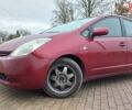 Красный Тойота Приус, объемом двигателя 1.5 л и пробегом 226 тыс. км за 6500 $, фото 1 на Automoto.ua