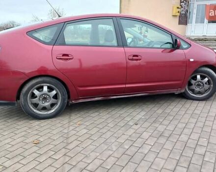 Красный Тойота Приус, объемом двигателя 1.5 л и пробегом 226 тыс. км за 6500 $, фото 7 на Automoto.ua