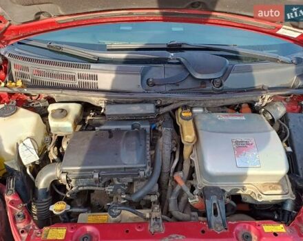 Червоний Тойота Пріус, об'ємом двигуна 1.5 л та пробігом 192 тис. км за 3999 $, фото 12 на Automoto.ua