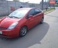 Красный Тойота Приус, объемом двигателя 1.5 л и пробегом 214 тыс. км за 4199 $, фото 1 на Automoto.ua
