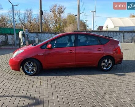 Червоний Тойота Пріус, об'ємом двигуна 1.5 л та пробігом 192 тис. км за 3999 $, фото 1 на Automoto.ua