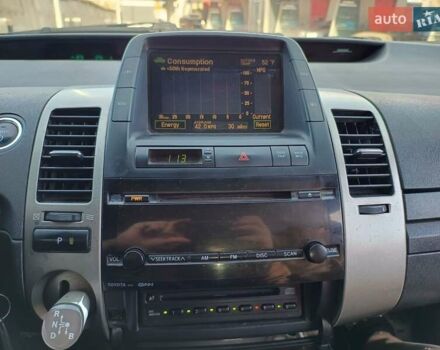 Червоний Тойота Пріус, об'ємом двигуна 1.5 л та пробігом 192 тис. км за 3999 $, фото 14 на Automoto.ua