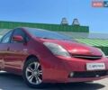 Червоний Тойота Пріус, об'ємом двигуна 1.5 л та пробігом 214 тис. км за 4290 $, фото 1 на Automoto.ua