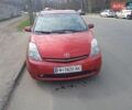 Красный Тойота Приус, объемом двигателя 1.5 л и пробегом 214 тыс. км за 4700 $, фото 1 на Automoto.ua