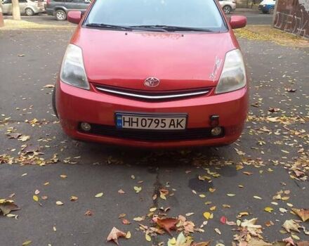 Красный Тойота Приус, объемом двигателя 1.5 л и пробегом 300 тыс. км за 7500 $, фото 4 на Automoto.ua