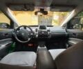 Красный Тойота Приус, объемом двигателя 1.5 л и пробегом 300 тыс. км за 8000 $, фото 1 на Automoto.ua