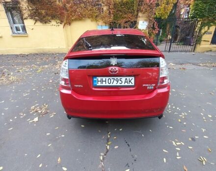 Красный Тойота Приус, объемом двигателя 1.5 л и пробегом 3 тыс. км за 7500 $, фото 2 на Automoto.ua