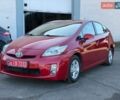 Красный Тойота Приус, объемом двигателя 1.8 л и пробегом 260 тыс. км за 9799 $, фото 1 на Automoto.ua