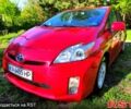 Красный Тойота Приус, объемом двигателя 1.8 л и пробегом 215 тыс. км за 9500 $, фото 1 на Automoto.ua