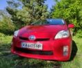 Красный Тойота Приус, объемом двигателя 1.8 л и пробегом 215 тыс. км за 9500 $, фото 1 на Automoto.ua