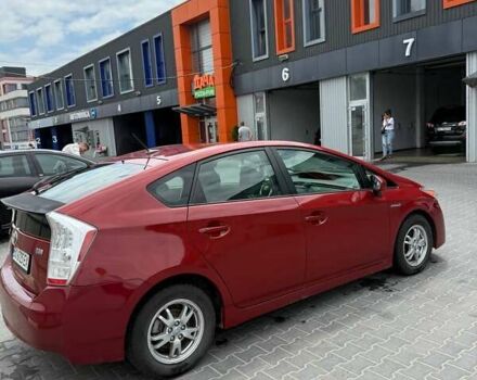 Красный Тойота Приус, объемом двигателя 1.8 л и пробегом 320 тыс. км за 10300 $, фото 4 на Automoto.ua