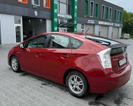 Красный Тойота Приус, объемом двигателя 1.8 л и пробегом 320 тыс. км за 10300 $, фото 2 на Automoto.ua