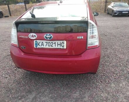 Красный Тойота Приус, объемом двигателя 1.8 л и пробегом 344 тыс. км за 8930 $, фото 4 на Automoto.ua