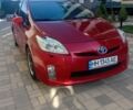 Красный Тойота Приус, объемом двигателя 1.8 л и пробегом 380 тыс. км за 7000 $, фото 1 на Automoto.ua