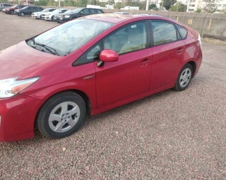 Красный Тойота Приус, объемом двигателя 1.8 л и пробегом 344 тыс. км за 8930 $, фото 1 на Automoto.ua