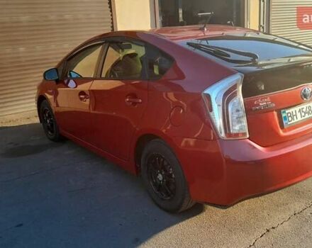 Красный Тойота Приус, объемом двигателя 1.8 л и пробегом 200 тыс. км за 10500 $, фото 2 на Automoto.ua