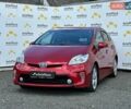 Красный Тойота Приус, объемом двигателя 1.8 л и пробегом 241 тыс. км за 12200 $, фото 1 на Automoto.ua