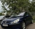 Красный Тойота Приус, объемом двигателя 1.5 л и пробегом 200 тыс. км за 8500 $, фото 1 на Automoto.ua