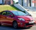 Красный Тойота Приус, объемом двигателя 1.8 л и пробегом 176 тыс. км за 10800 $, фото 1 на Automoto.ua