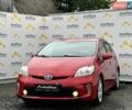 Красный Тойота Приус, объемом двигателя 1.8 л и пробегом 295 тыс. км за 11999 $, фото 1 на Automoto.ua