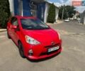 Красный Тойота Приус, объемом двигателя 1.5 л и пробегом 230 тыс. км за 7700 $, фото 1 на Automoto.ua