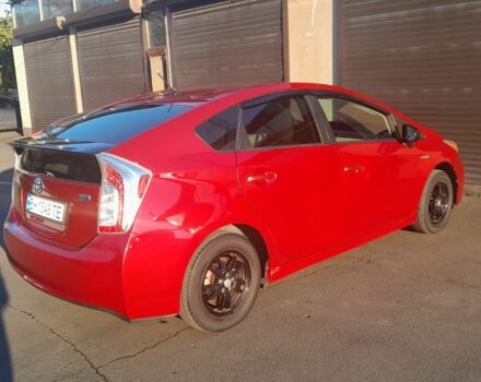 Красный Тойота Приус, объемом двигателя 1.8 л и пробегом 200 тыс. км за 10500 $, фото 2 на Automoto.ua