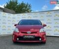 Червоний Тойота Пріус, об'ємом двигуна 1.8 л та пробігом 295 тис. км за 12200 $, фото 1 на Automoto.ua