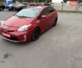 Красный Тойота Приус, объемом двигателя 1.8 л и пробегом 167 тыс. км за 12500 $, фото 1 на Automoto.ua