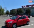 Красный Тойота Приус, объемом двигателя 1.5 л и пробегом 140 тыс. км за 10500 $, фото 1 на Automoto.ua