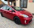 Красный Тойота Приус, объемом двигателя 1.8 л и пробегом 242 тыс. км за 11800 $, фото 1 на Automoto.ua