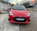 Красный Тойота Приус, объемом двигателя 1.5 л и пробегом 169 тыс. км за 12500 $, фото 1 на Automoto.ua