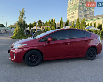 Красный Тойота Приус, объемом двигателя 1.8 л и пробегом 269 тыс. км за 9900 $, фото 1 на Automoto.ua