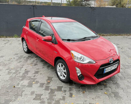 Красный Тойота Приус, объемом двигателя 1.5 л и пробегом 95 тыс. км за 11800 $, фото 1 на Automoto.ua