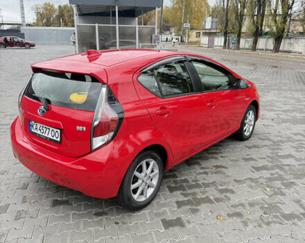 Красный Тойота Приус, объемом двигателя 1.5 л и пробегом 95 тыс. км за 11800 $, фото 2 на Automoto.ua