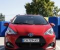 Красный Тойота Приус, объемом двигателя 1.5 л и пробегом 92 тыс. км за 11900 $, фото 1 на Automoto.ua