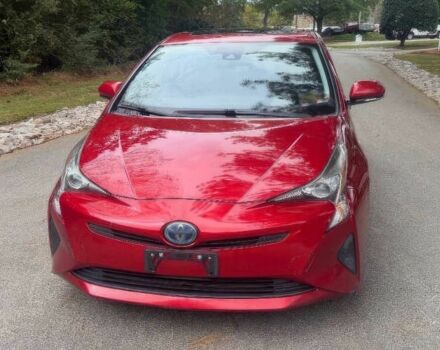 Красный Тойота Приус, объемом двигателя 1.8 л и пробегом 77 тыс. км за 8000 $, фото 1 на Automoto.ua