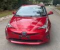 Красный Тойота Приус, объемом двигателя 1.8 л и пробегом 77 тыс. км за 8000 $, фото 1 на Automoto.ua
