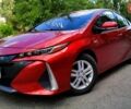 Красный Тойота Приус, объемом двигателя 1.8 л и пробегом 125 тыс. км за 19900 $, фото 1 на Automoto.ua