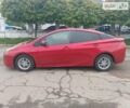 Красный Тойота Приус, объемом двигателя 1.8 л и пробегом 130 тыс. км за 13911 $, фото 1 на Automoto.ua