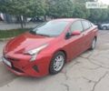 Красный Тойота Приус, объемом двигателя 1.8 л и пробегом 130 тыс. км за 13911 $, фото 1 на Automoto.ua