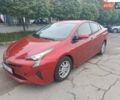 Красный Тойота Приус, объемом двигателя 1.8 л и пробегом 130 тыс. км за 13000 $, фото 1 на Automoto.ua