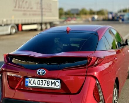 Красный Тойота Приус, объемом двигателя 1.8 л и пробегом 126 тыс. км за 19000 $, фото 1 на Automoto.ua