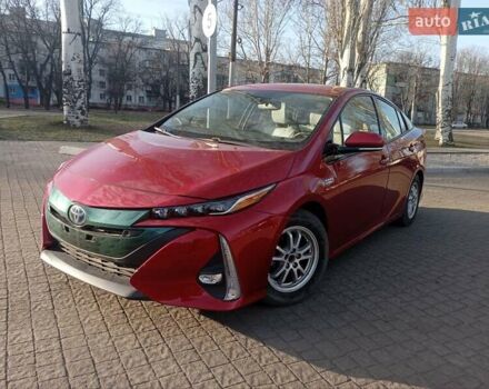 Красный Тойота Приус, объемом двигателя 1.8 л и пробегом 170 тыс. км за 20500 $, фото 1 на Automoto.ua