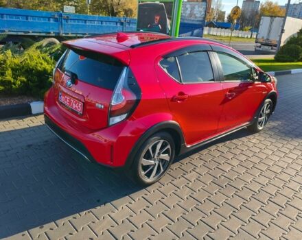 Красный Тойота Приус, объемом двигателя 1.5 л и пробегом 66 тыс. км за 14800 $, фото 2 на Automoto.ua