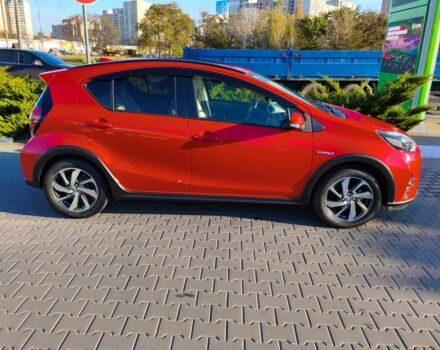 Красный Тойота Приус, объемом двигателя 1.5 л и пробегом 66 тыс. км за 14800 $, фото 1 на Automoto.ua